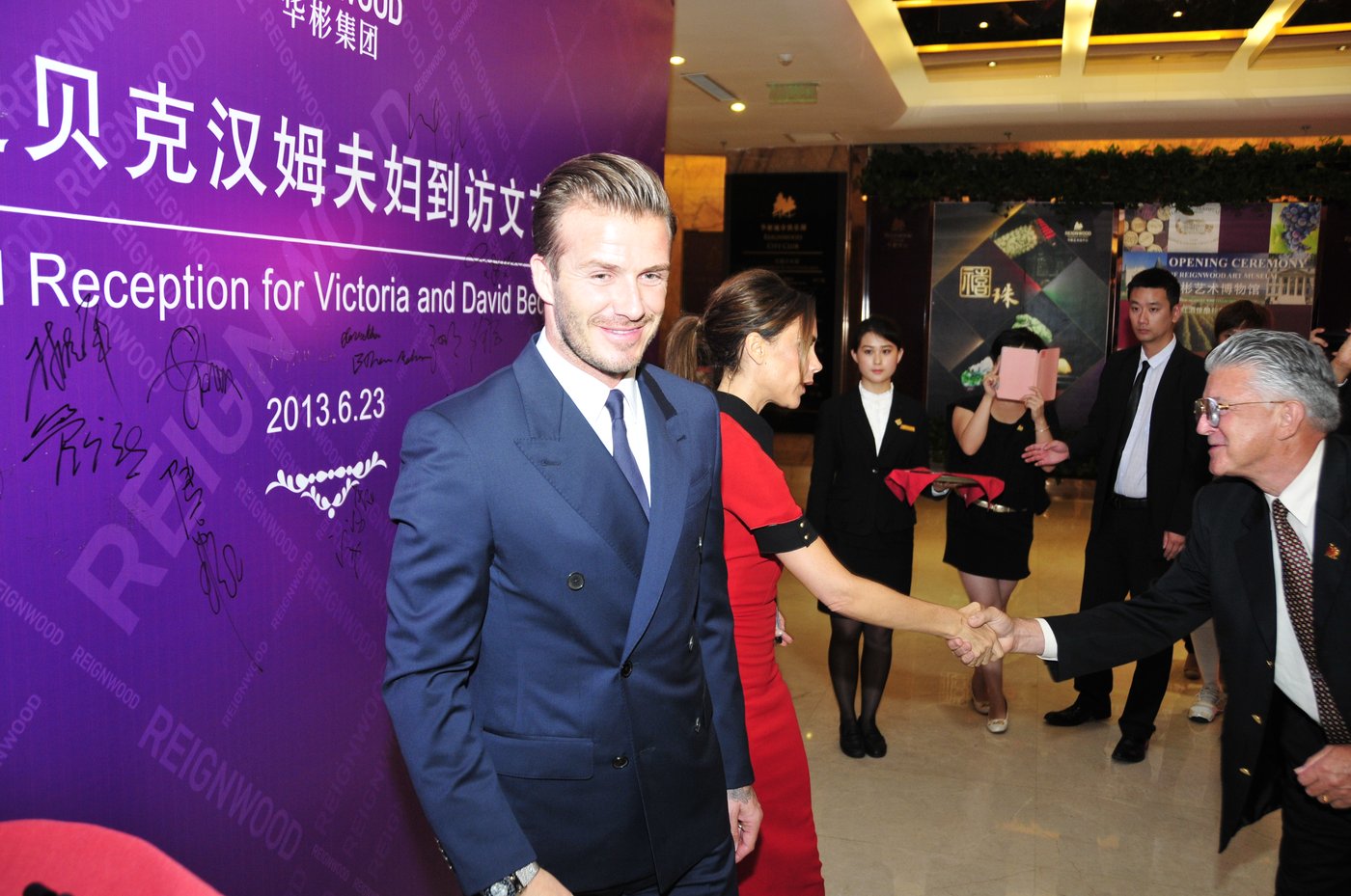 Brett Brasier with David and Victoria Beckham at Reignwood