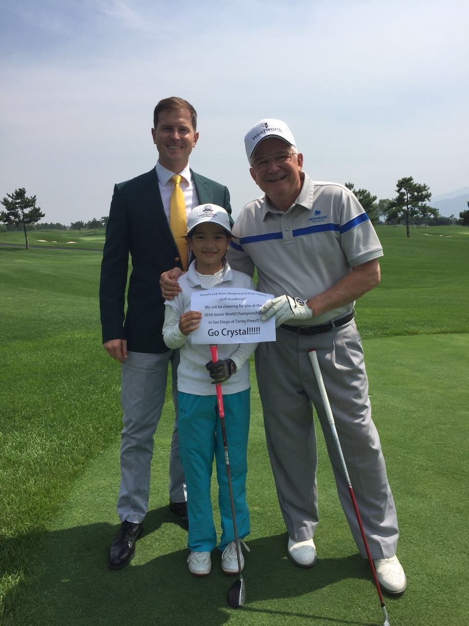 Brett and Michael Brasier sending off a young player, Crystal, ahead of the 2016 Junior World Championships