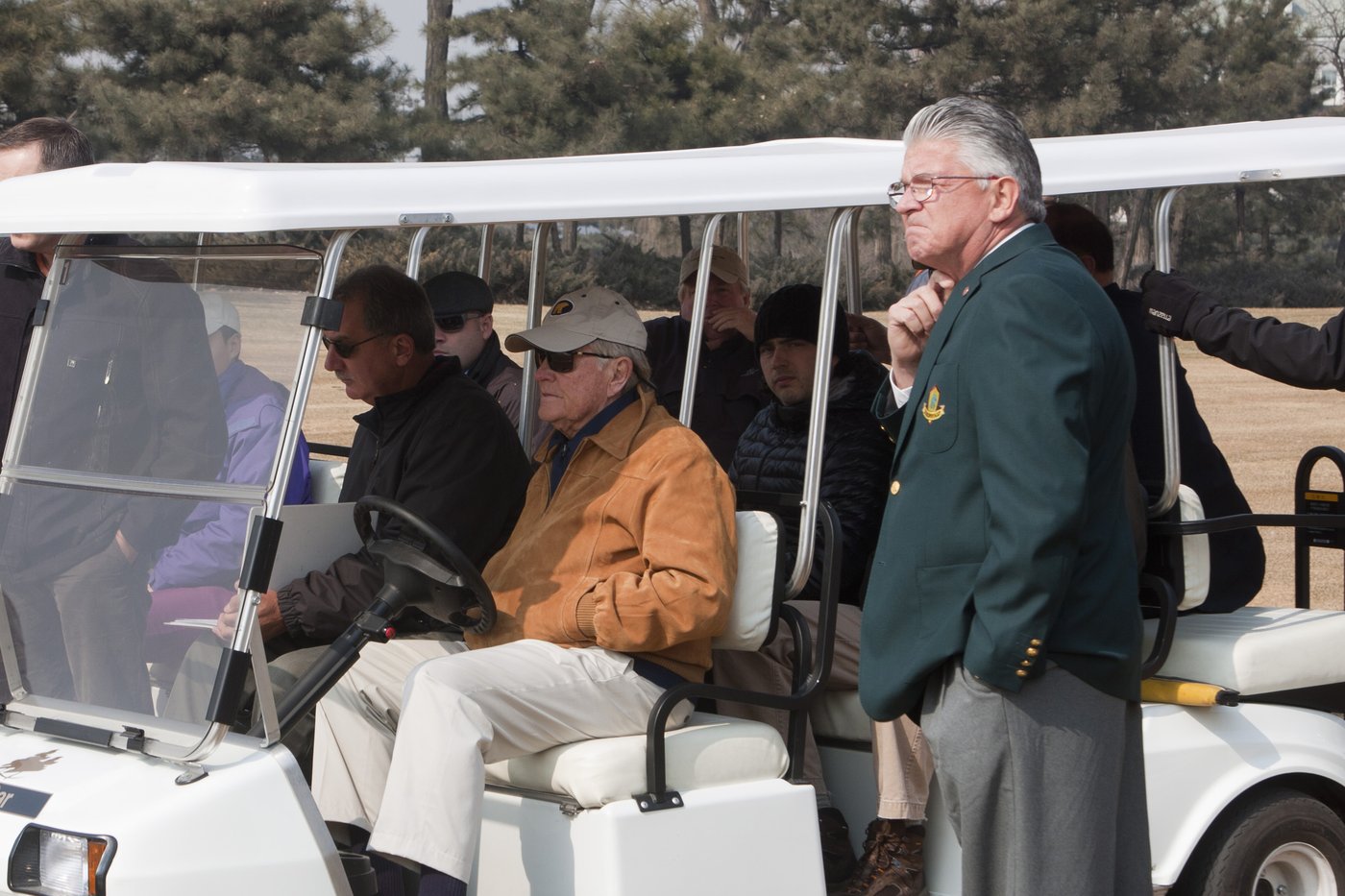 Brett Brasier with Jack Nicklaus and his entourage by a golf cart