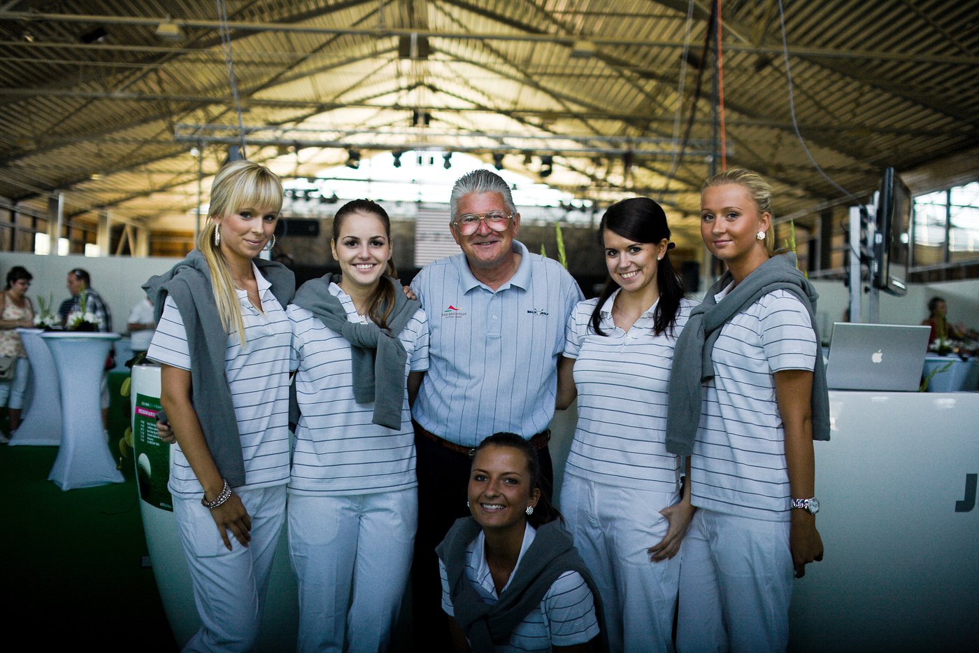 Brett Brasier with staff promoting Red Mountain Golf Club at a Czech Open event