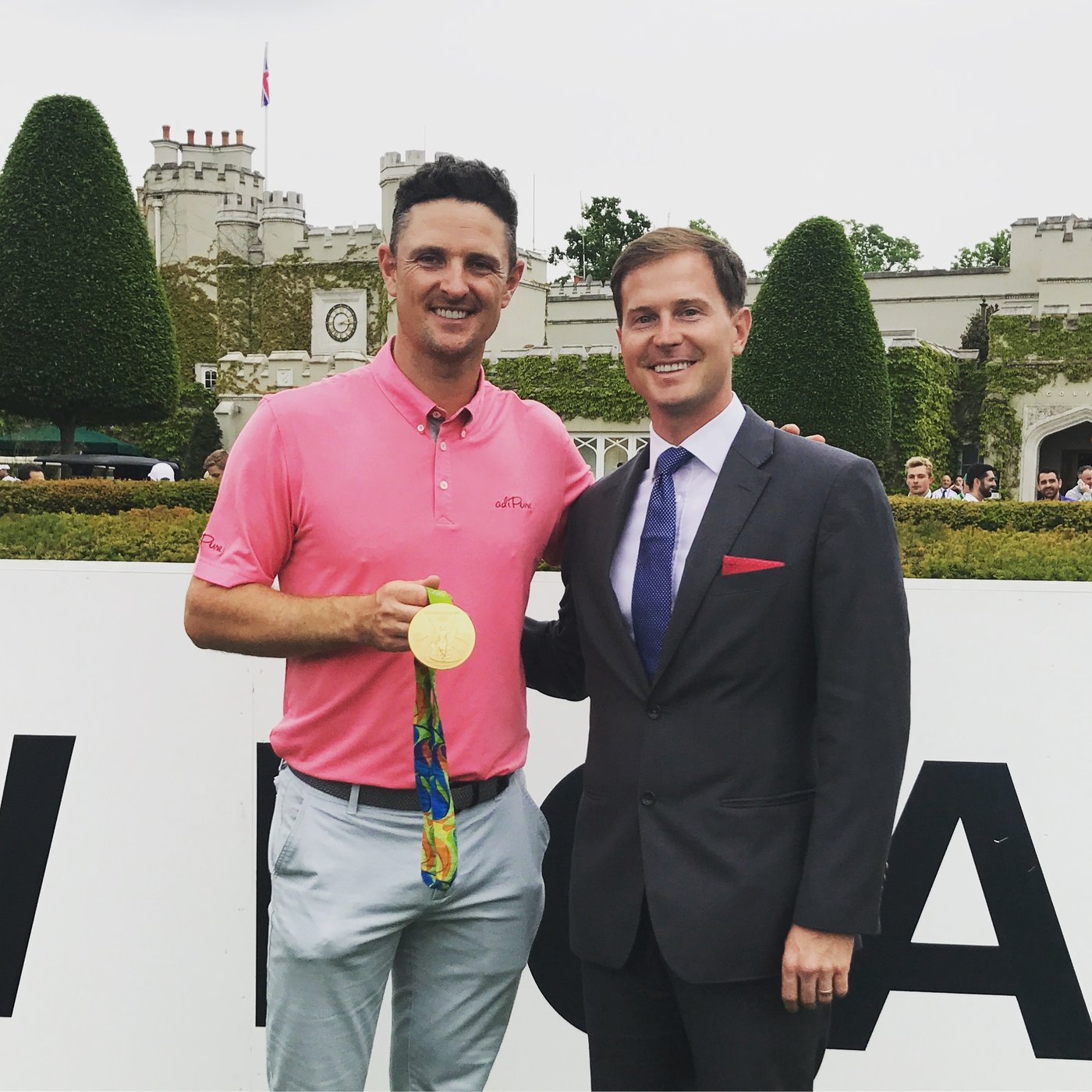 Michael Brasier with Justin Rose and his 2016 Rio Olympics gold medal